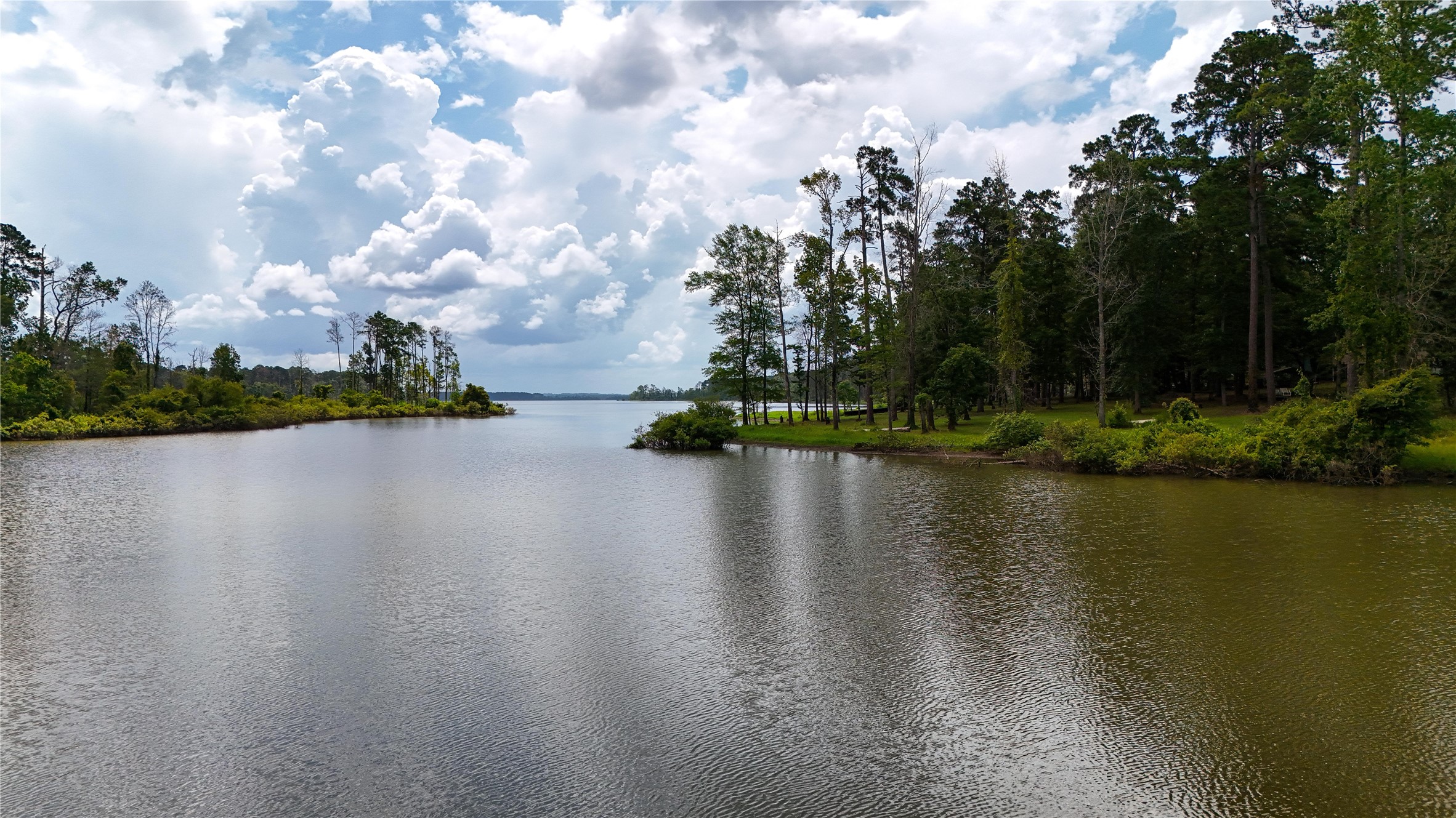 705 FM 705 Broaddus, TX 75929 - Photo 3 of 14 a view of a lake with houses