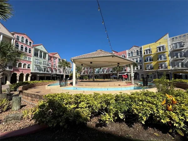 a view of a building with a yard