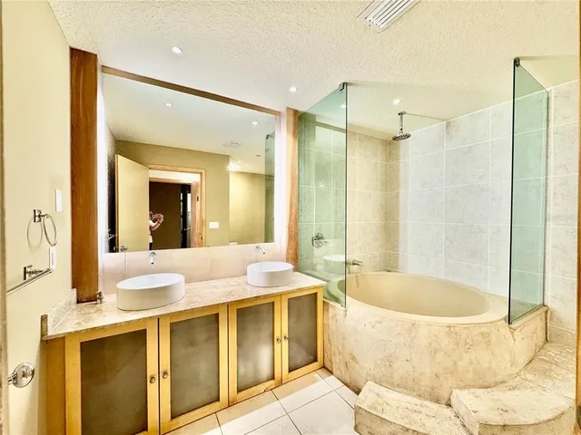 a living room with furniture a window and a table