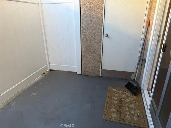 a view of a backyard with a sitting area