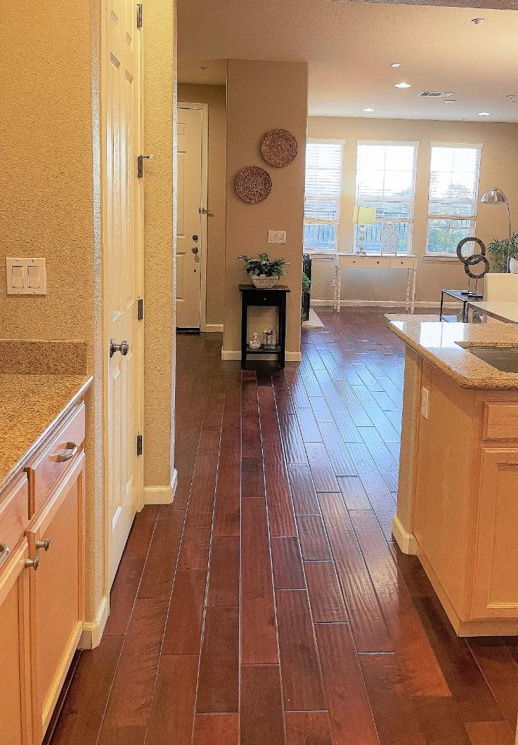 5150 Fioli Loop San Ramon, CA 94582 - Photo 14 of 38 a spacious bathroom with a granite countertop sink a mirror and a shower