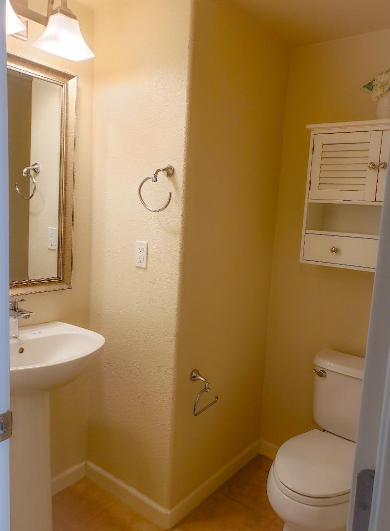 5150 Fioli Loop San Ramon, CA 94582 - Photo 15 of 38 a bathroom with a granite countertop toilet and a sink