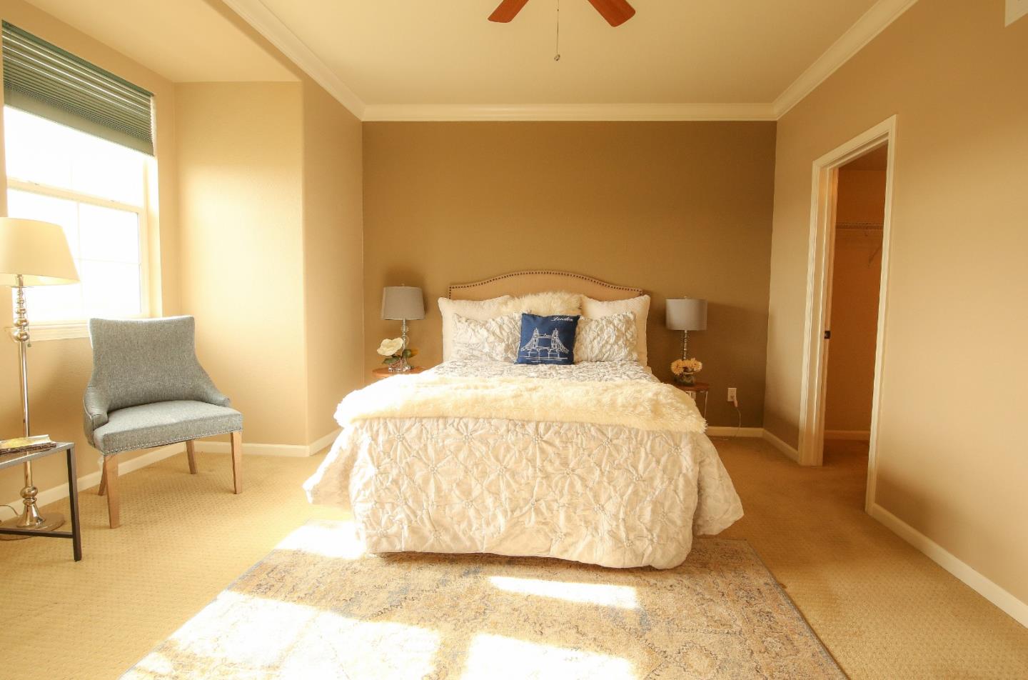 5150 Fioli Loop San Ramon, CA 94582 - Photo 18 of 38 a bedroom with a bed and chair