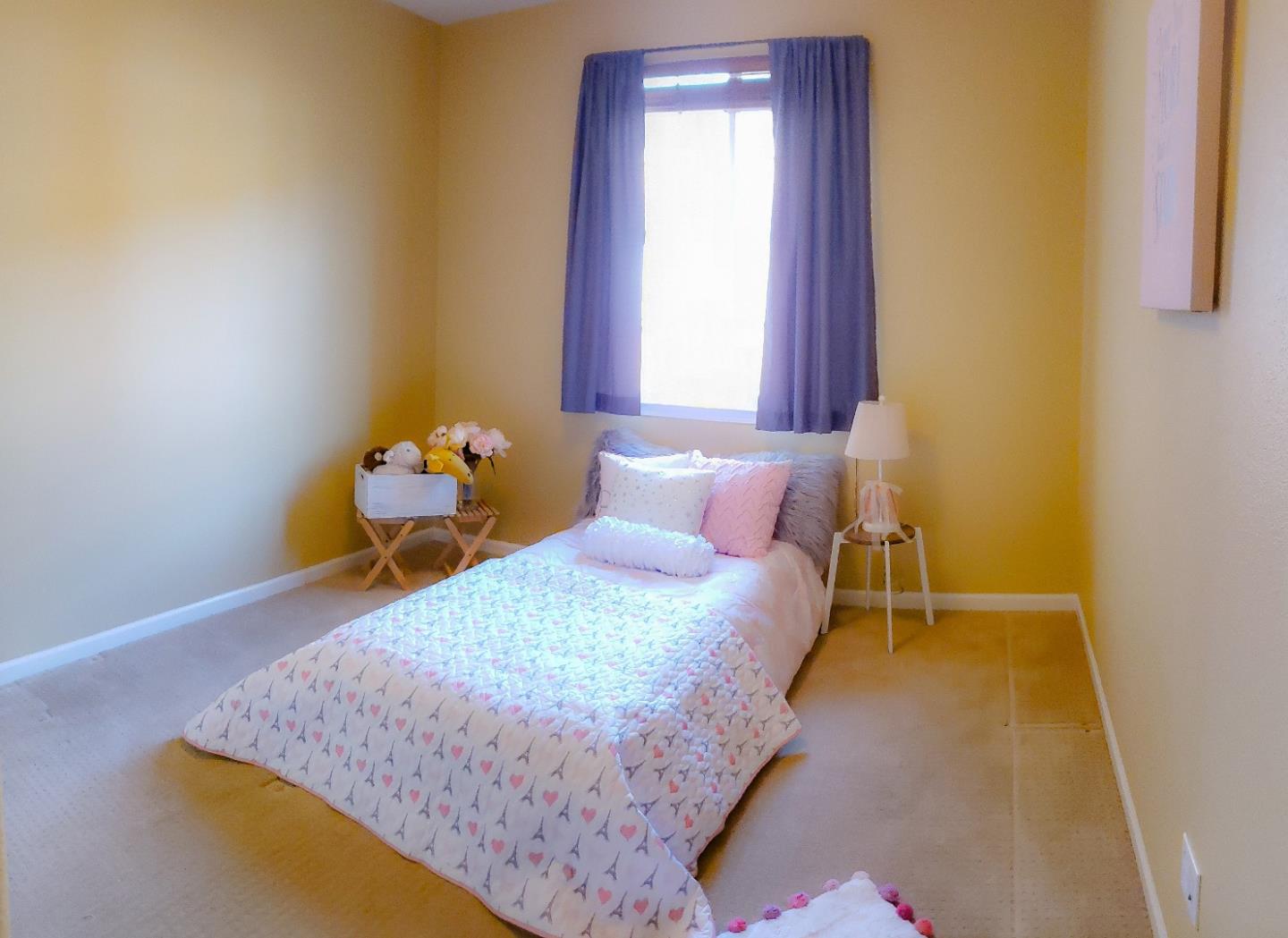 5150 Fioli Loop San Ramon, CA 94582 - Photo 27 of 38 a bedroom with a bed and window
