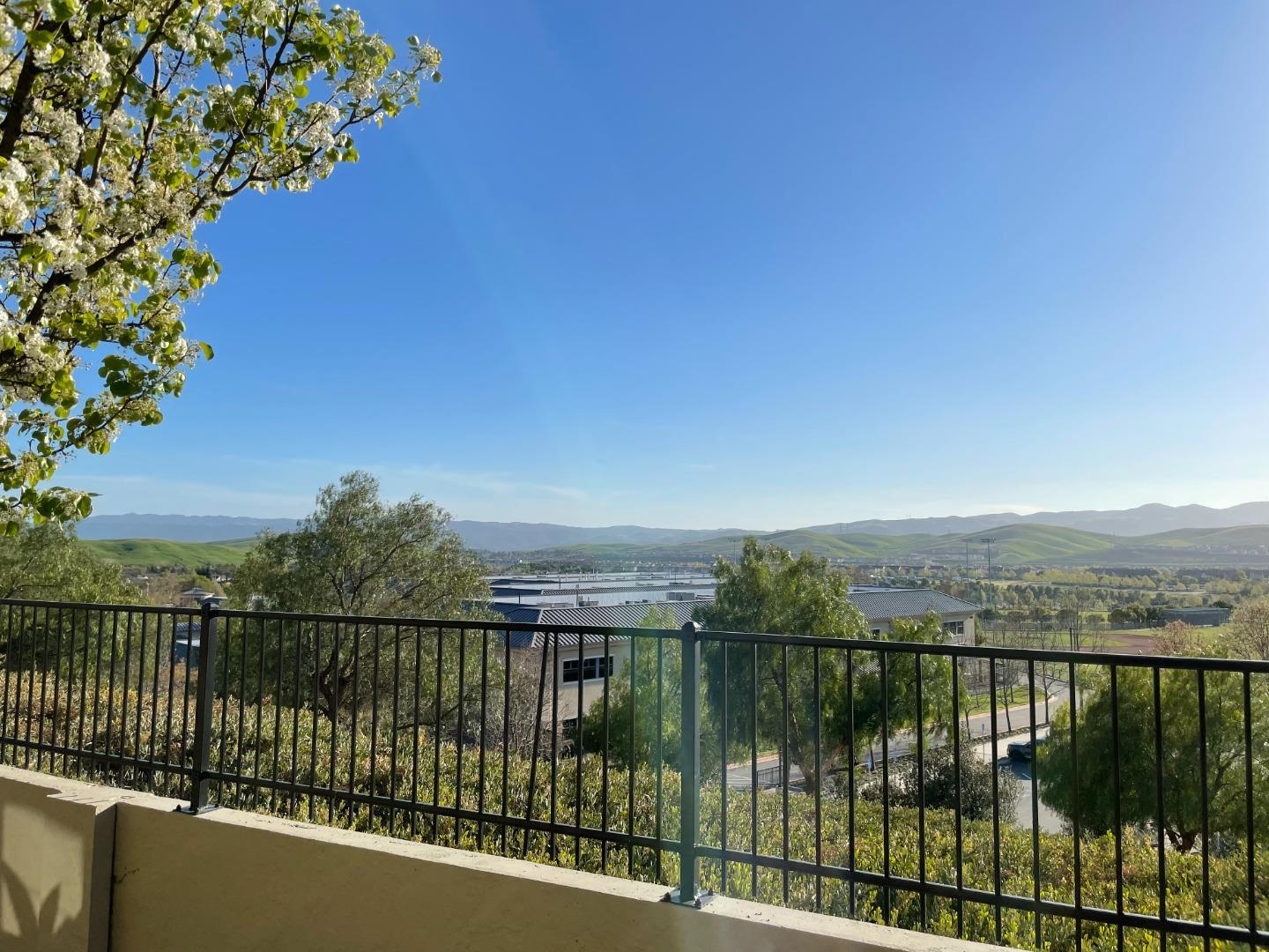 5150 Fioli Loop San Ramon, CA 94582 - Photo 3 of 38 a view of a lake from a balcony
