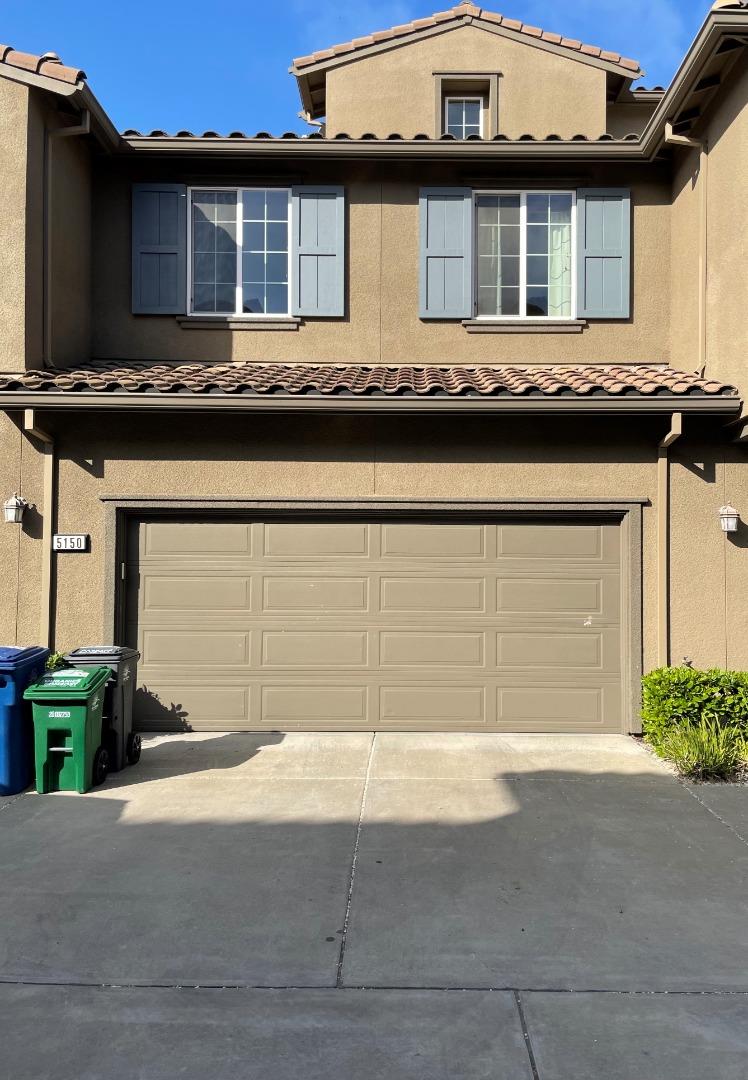 5150 Fioli Loop San Ramon, CA 94582 - Photo 35 of 38 a front view of a house with garage