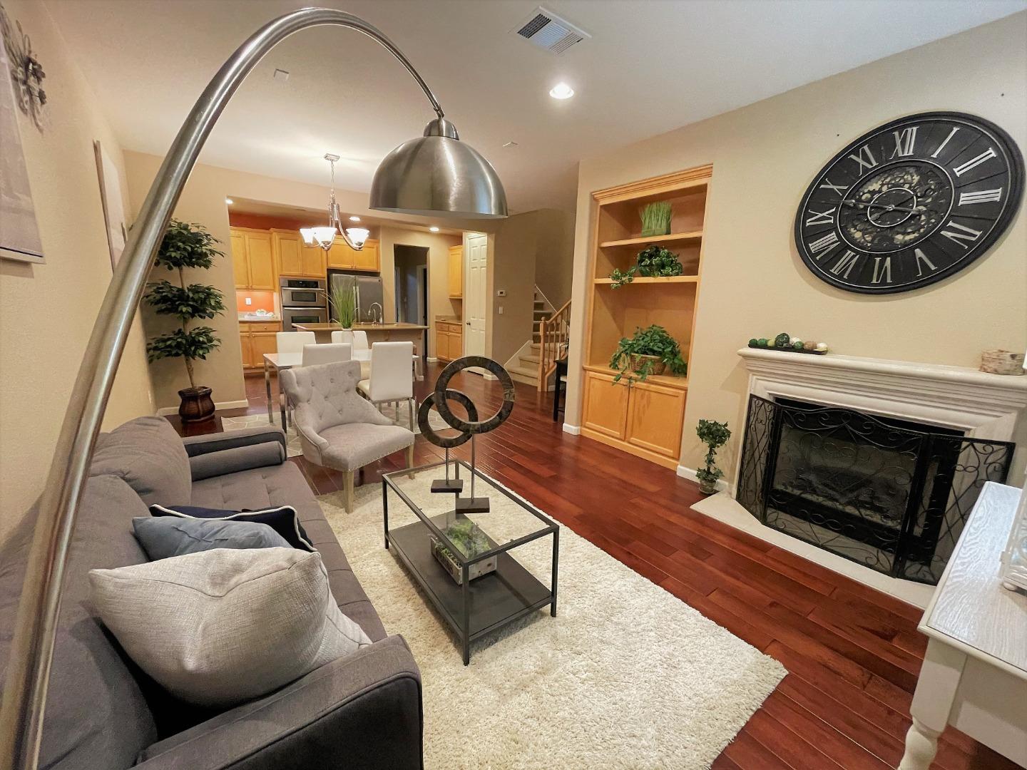 5150 Fioli Loop San Ramon, CA 94582 - Photo 8 of 38 a living room with furniture and a fireplace