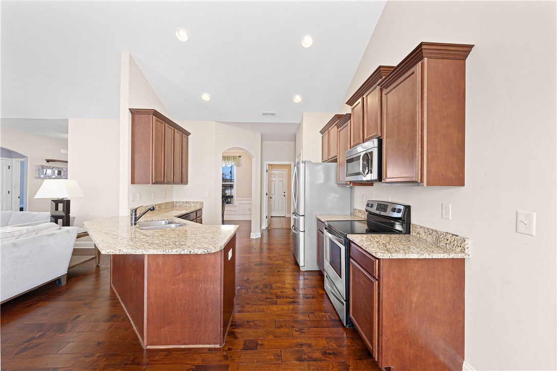 409 Coldstream Court Seneca, SC 29678 - Photo 15 of 40 This spacious kitchen features ample counter space and an open design, perfect for daily living and entertaining.