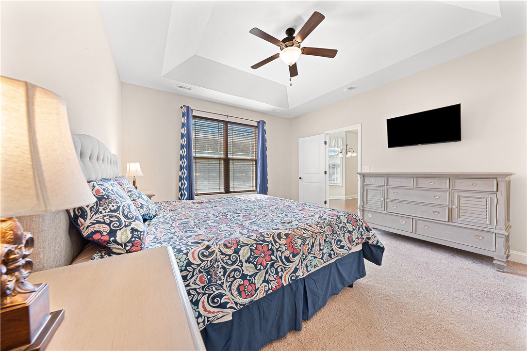 409 Coldstream Court Seneca, SC 29678 - Photo 20 of 40 This inviting bedroom features ample natural light and thoughtful ceiling design.