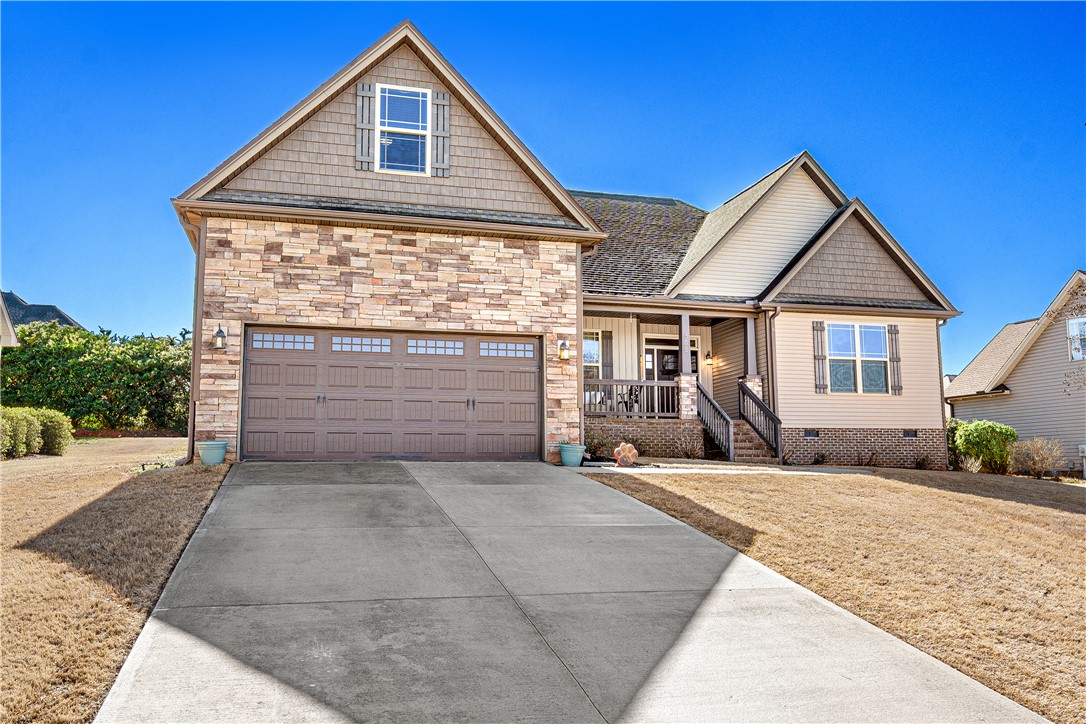 409 Coldstream Court Seneca, SC 29678 - Photo 2 of 40 This charming home offers a spacious layout, a welcoming porch, and a two-car garage.