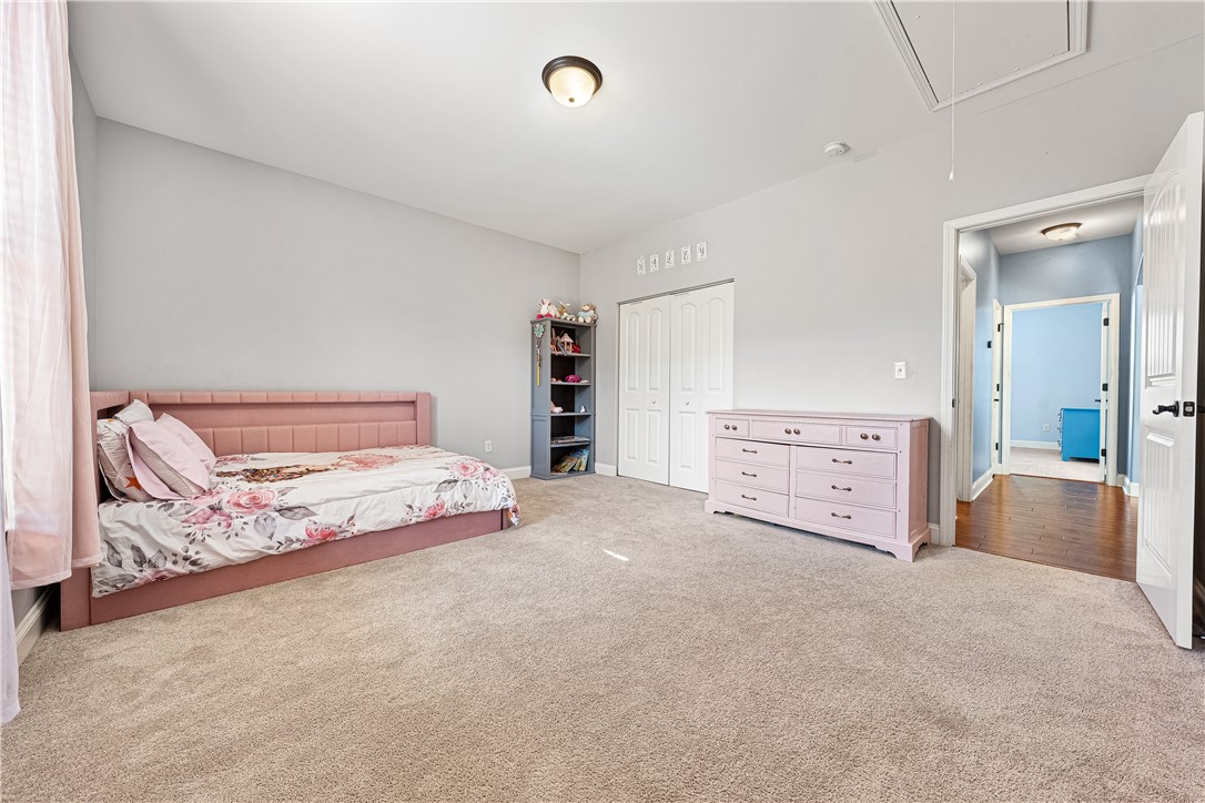 409 Coldstream Court Seneca, SC 29678 - Photo 26 of 40 This spacious bedroom offers ample comfort and privacy, featuring plush carpeting and generous natural light.