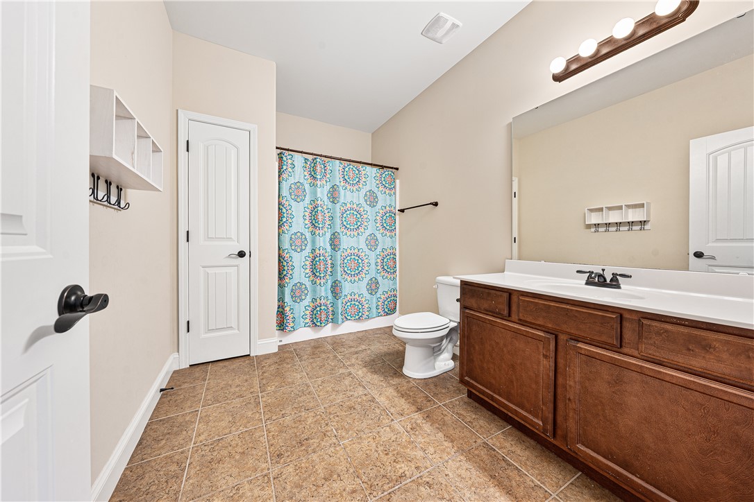 409 Coldstream Court Seneca, SC 29678 - Photo 27 of 40 This clean and inviting bathroom features ample vanity space and durable tile flooring.
