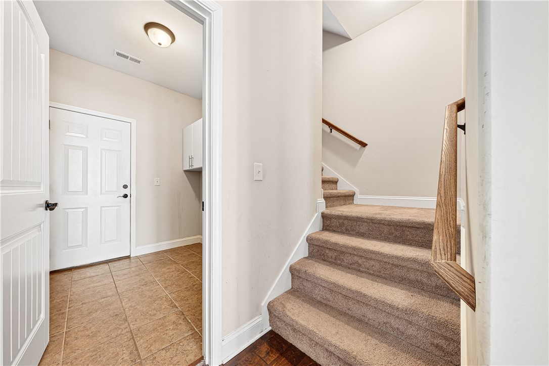 409 Coldstream Court Seneca, SC 29678 - Photo 30 of 40 This entry area features a staircase leading to additional living spaces.