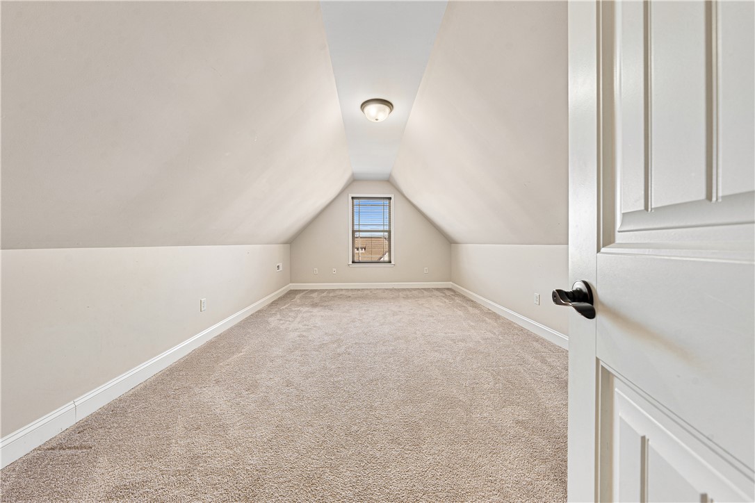 409 Coldstream Court Seneca, SC 29678 - Photo 31 of 40 This spacious attic room offers endless possibilities for a personalized sanctuary.