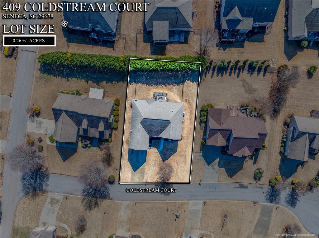 409 Coldstream Court Seneca, SC 29678 - Photo 36 of 40 An aerial view showcases a residential property with ample yard space and neighboring homes.