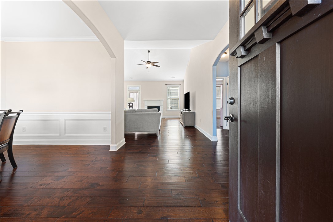 409 Coldstream Court Seneca, SC 29678 - Photo 7 of 40 Step inside this inviting home featuring rich hardwood floors and classic wainscoting.