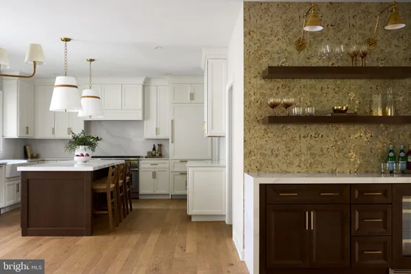 a kitchen with a wooden floor