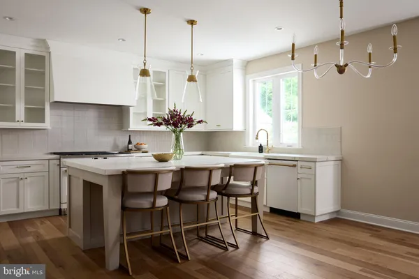 a living room with a fireplace and window