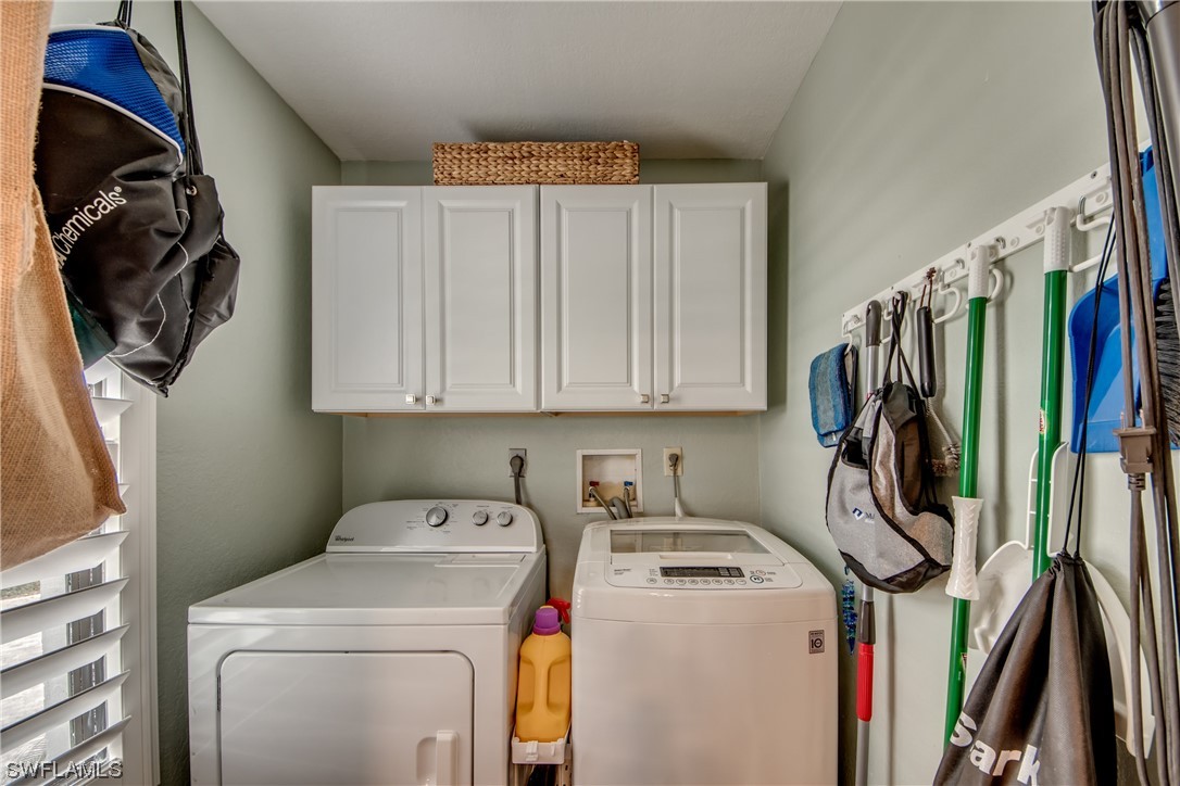 16611 Stringfellow Road, Unit 203 Bokeelia, FL 33922 - Photo 29 of 48 a view of storage and utility room with stairs