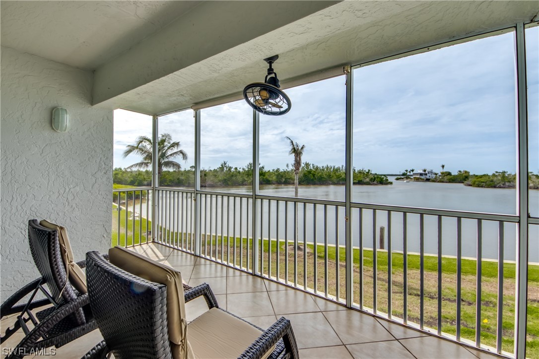 16611 Stringfellow Road, Unit 203 Bokeelia, FL 33922 - Photo 33 of 48 a view of balcony with furniture