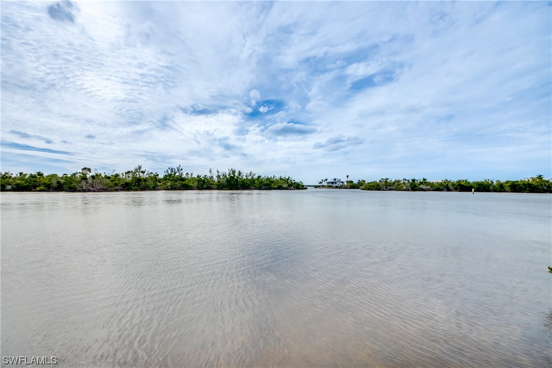 16611 Stringfellow Road, Unit 203 Bokeelia, FL 33922 - Photo 41 of 48 a view of a lake