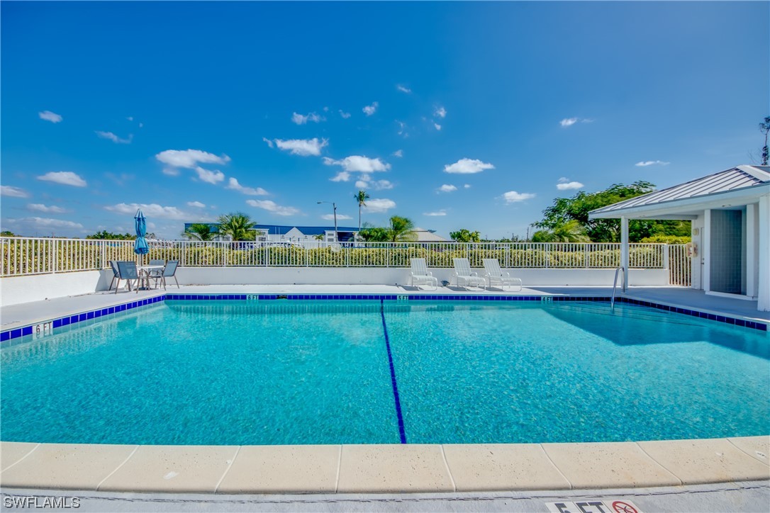 16611 Stringfellow Road, Unit 203 Bokeelia, FL 33922 - Photo 43 of 48 a view of an outdoor space and a yard