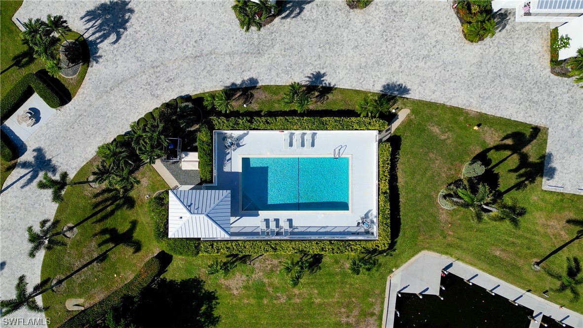 16611 Stringfellow Road, Unit 203 Bokeelia, FL 33922 - Photo 44 of 48 an aerial view of a house with a swimming pool