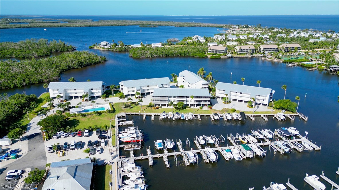 16611 Stringfellow Road, Unit 203 Bokeelia, FL 33922 - Photo 45 of 48 a view of a lake