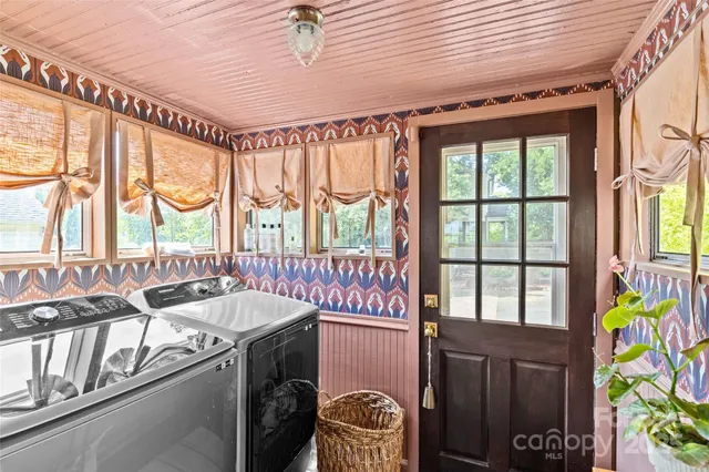 a kitchen with granite countertop a sink and a stove