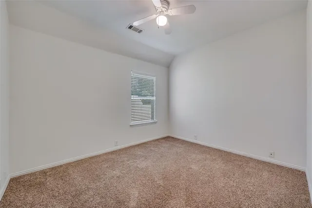 a bathroom with a sink double vanity granite tub shower and a mirror