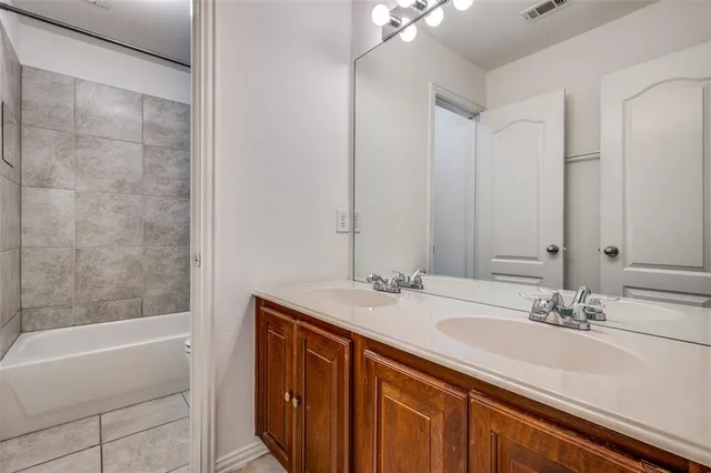 a view of storage and utility room with washer and dryer