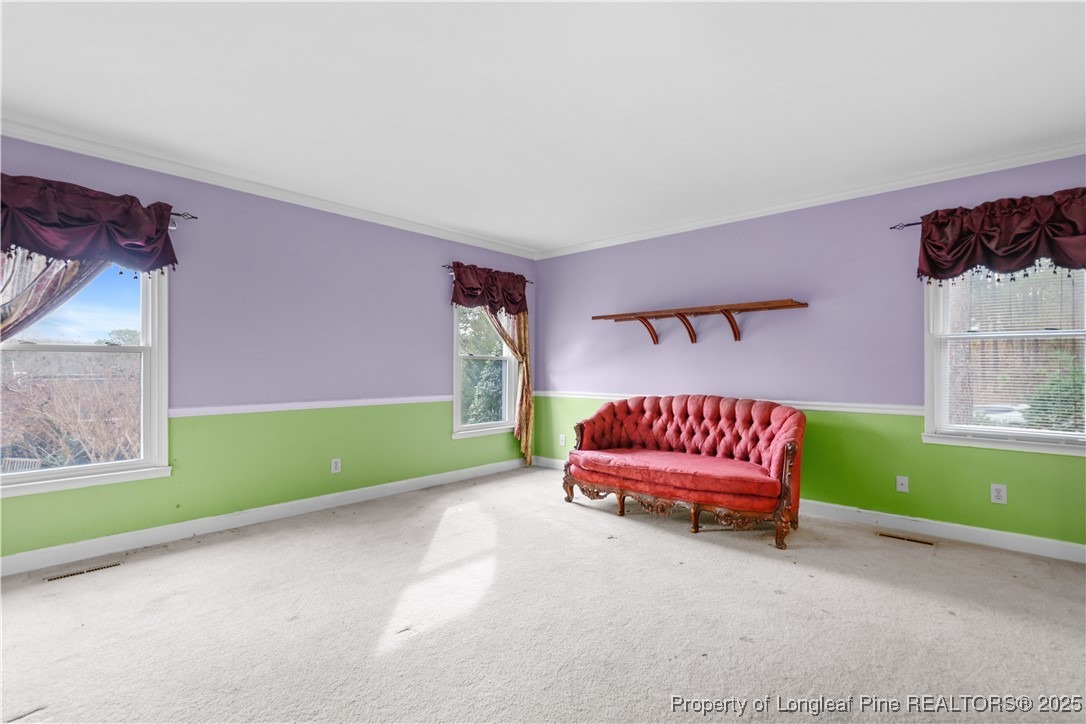 124 Racquet Lane Pinehurst, NC 28374 - Photo 11 of 25 a bedroom with a bed and a window