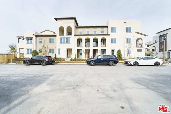 a cars parked in front of a building