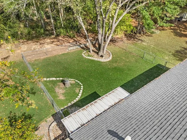 a view of backyard with green space