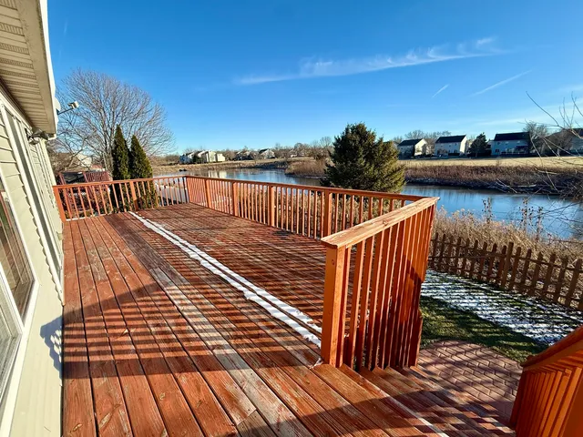 a view of balcony with wooden floor and outdoor space