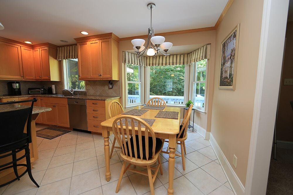 7905 Hardwick Drive Raleigh, NC 27615 - Photo 7 of 26 Easy care tile floors in the kitchen, bay window lets in natural light ! Dining Nook