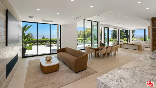 a kitchen with a table and chairs in it
