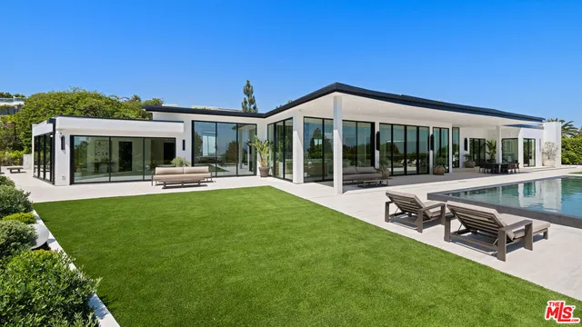 a view of a house with backyard porch and patio
