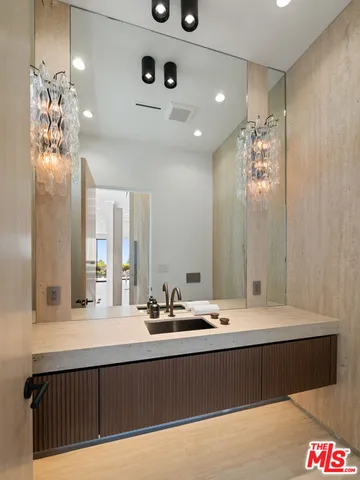 swimming pool with outdoor seating and garden