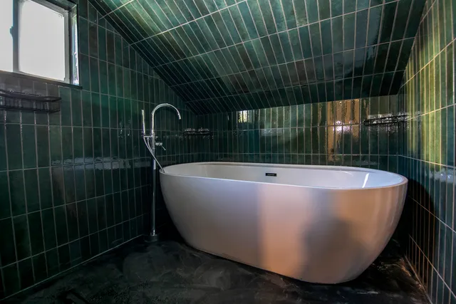 a view of a bathtub in a bathroom