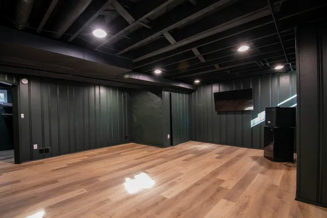 a bed room with a large mirror