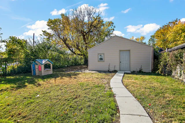 a bathroom with a sink and a yard