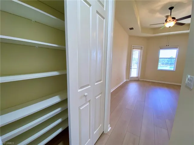 a view of a room with racks on the wall