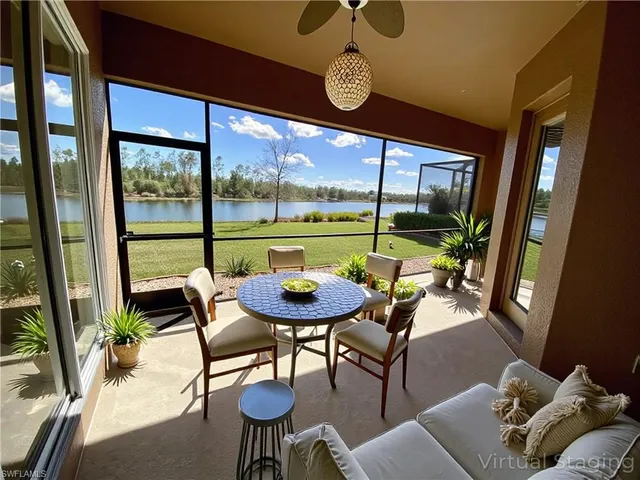 a bedroom with a bed couch and window