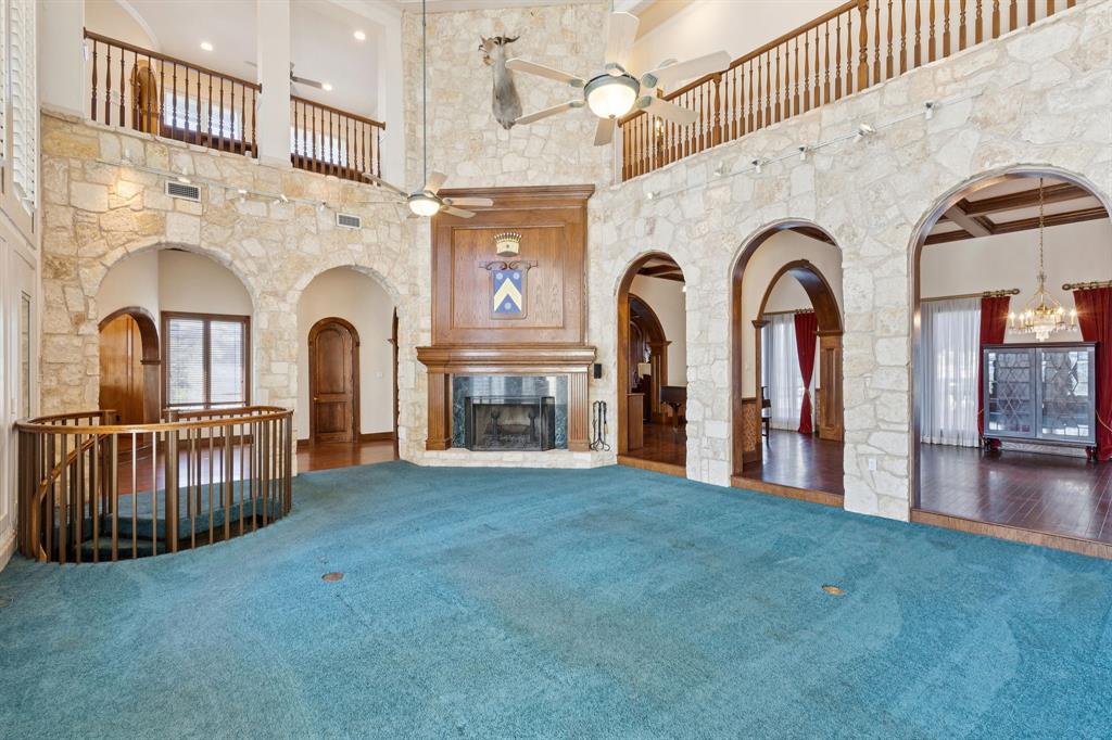 9888 Boat Club Road Fort Worth, TX 76179 - Photo 21 of 38 a view of empty room with fireplace and windows
