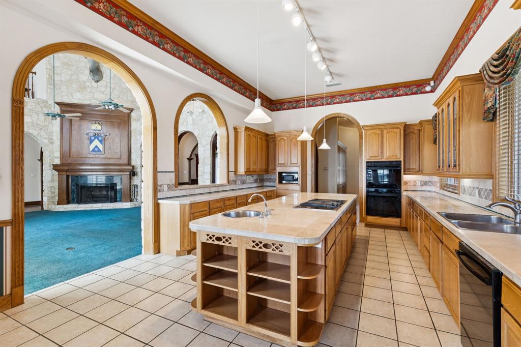 9888 Boat Club Road Fort Worth, TX 76179 - Photo 24 of 38 a large living room with a large window