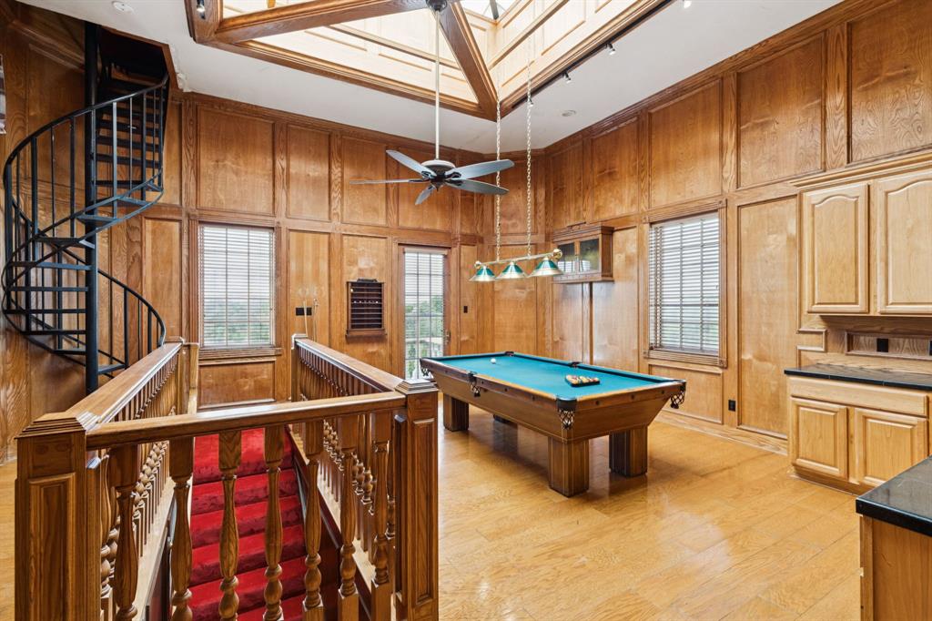 9888 Boat Club Road Fort Worth, TX 76179 - Photo 27 of 38 a room with lots of windows and furniture