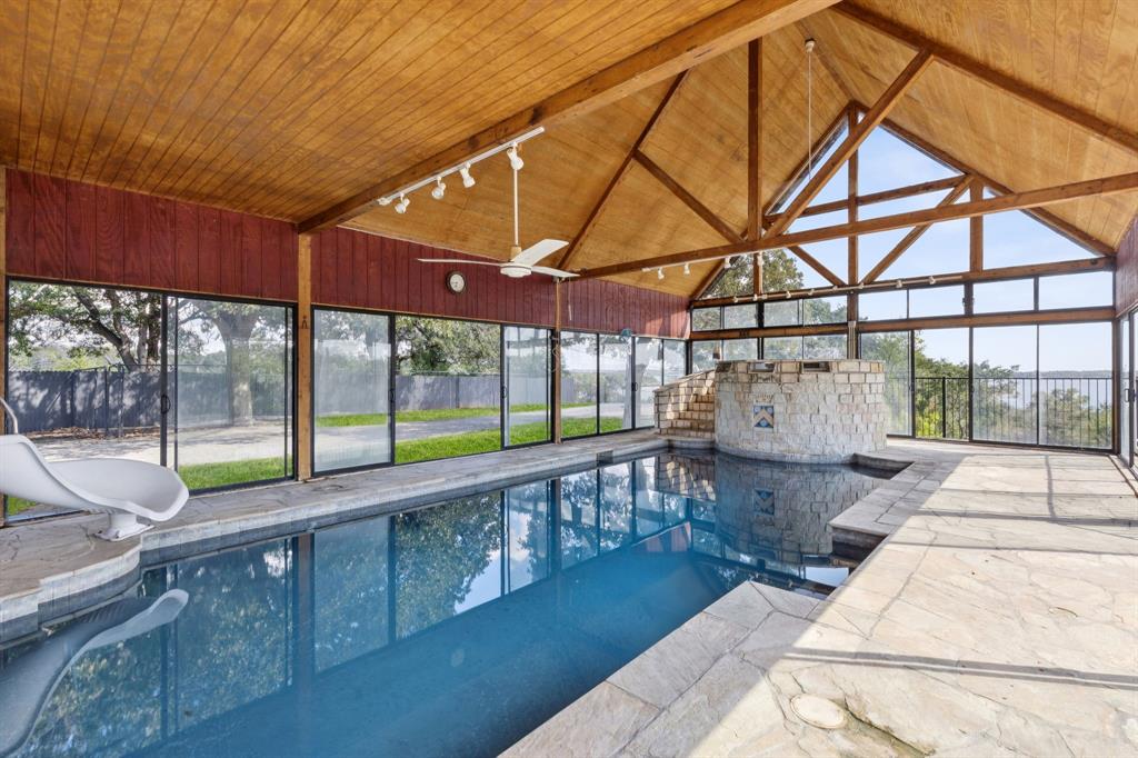 9888 Boat Club Road Fort Worth, TX 76179 - Photo 8 of 38 a view of a swimming pool with a patio