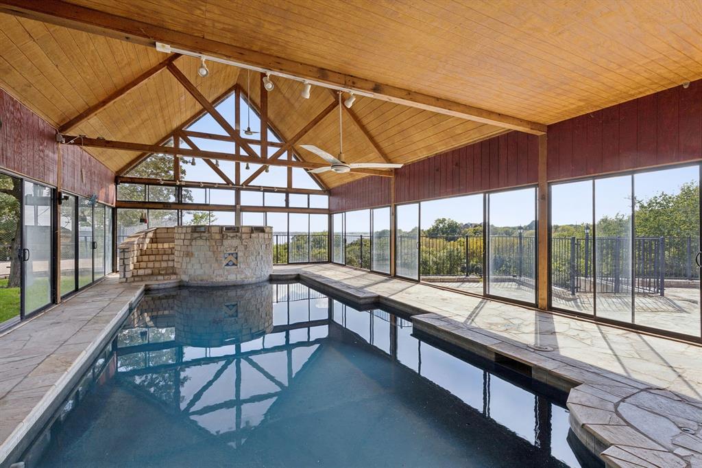 9888 Boat Club Road Fort Worth, TX 76179 - Photo 9 of 38 a view of a swimming pool with a patio