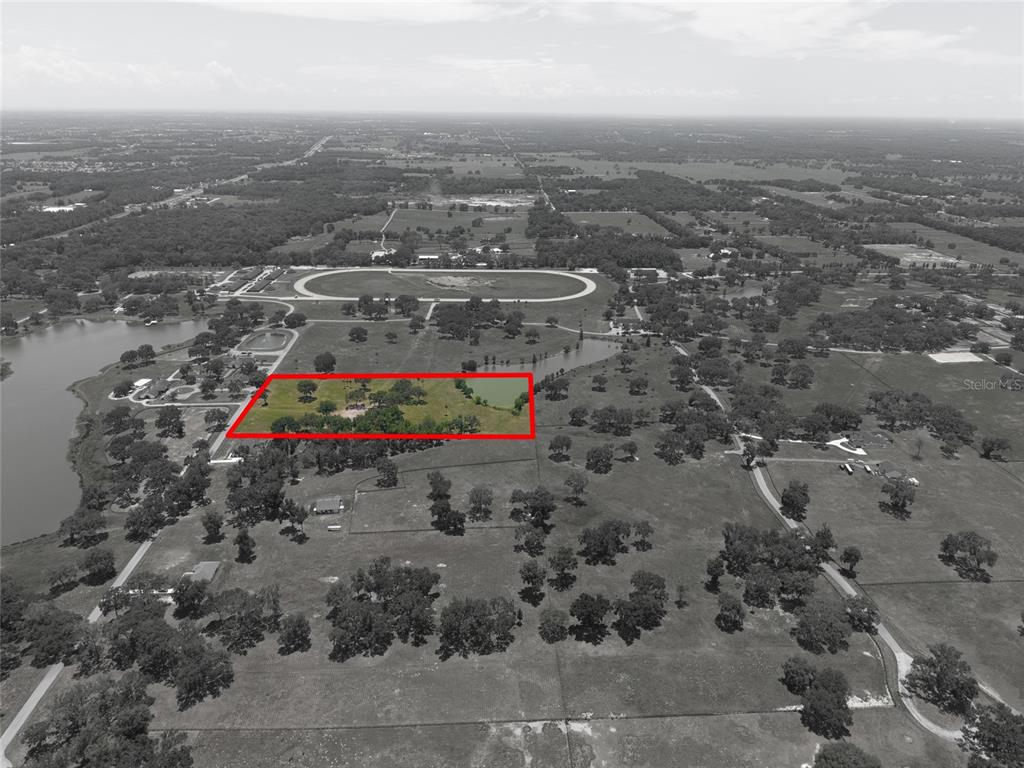 Southeast 61st Terrace Road, Unit 15 Summerfield, FL 34491 - Photo 9 of 18 an aerial view of lot of trees